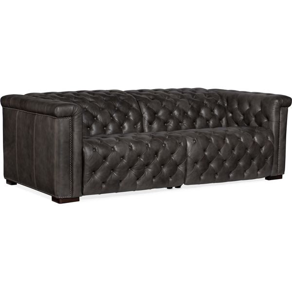 Czarna sofa z pikowana tapicerka i szerokimi pod okietnikami wc5456968